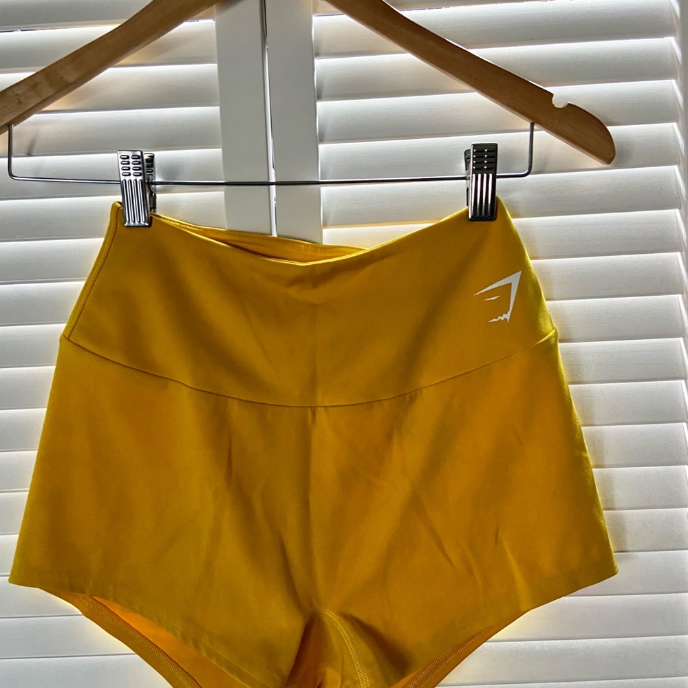 Bright yellow Gym Shark Training Shorts.